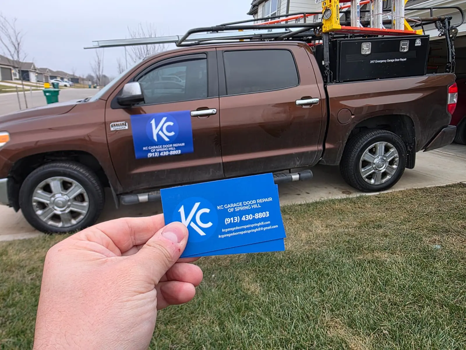 Professional Garage Door Repair Spring Hill technician fixing residential garage door system