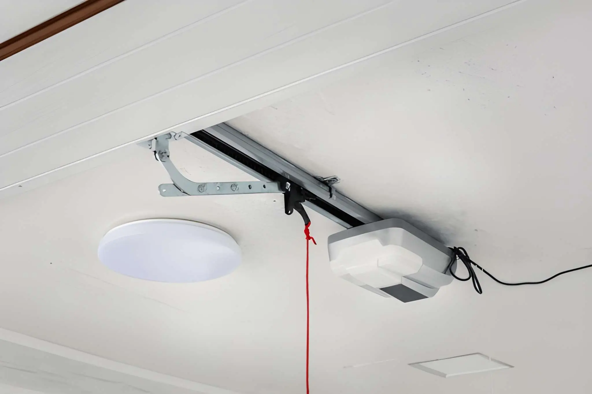 KC Garage Door Repair Hillsdale installing modern garage door openers for residential and commercial properties