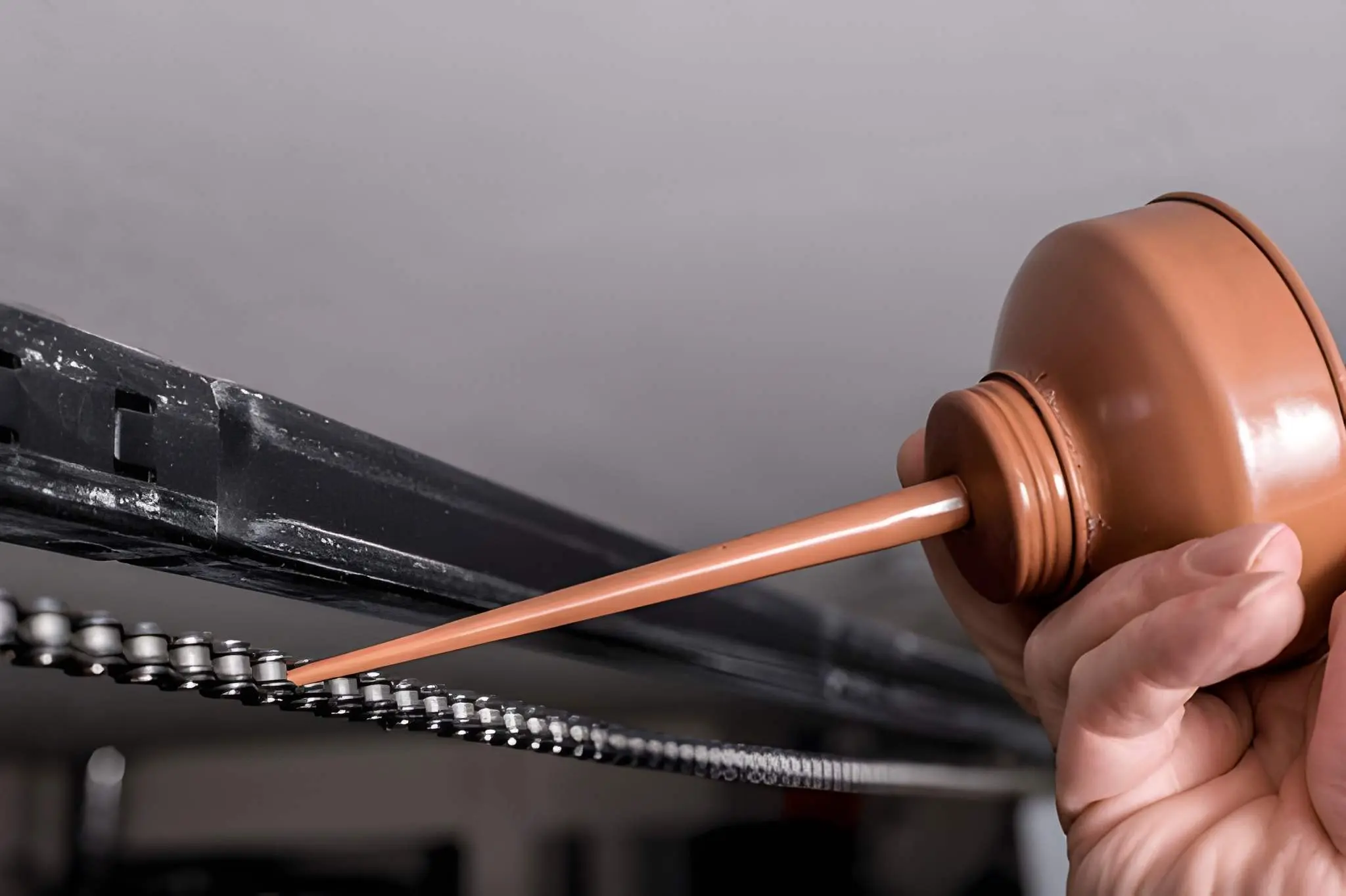 Professional Garage Door Service fixing a modern residential garage door efficiently